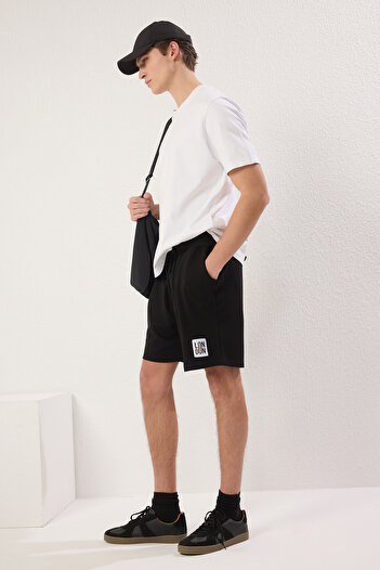 Trendyol Collection Чорний текстурний пікантний сорт Бермудський TMNSS25SR00030 з етикеткою London Labelled Black Textured Pique Pique Sort Bermuda TMNSS25SR00030