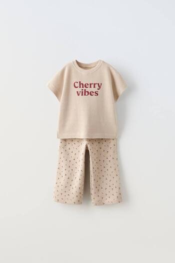 Karan Kids Girl's Waffle Fabric Flared Leg Bottom Top Set