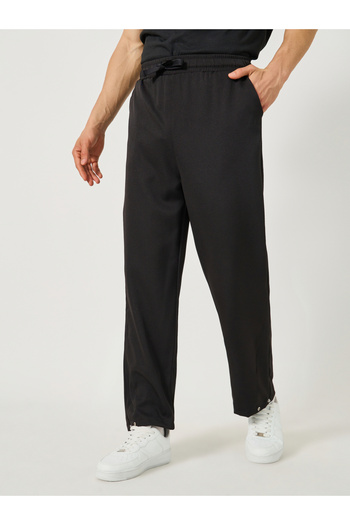 Styli Solid Loose Fit Mid Rise Pants with Drawstring