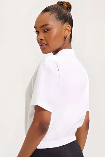 Nike Air Pique Polo Crop Tee Loose Fit Loose Cut Πολυεστερικό κοντό μπλουζάκι λευκό