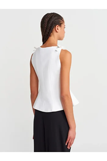 Dilvin 50285 Bow Peplum Top-Ecru