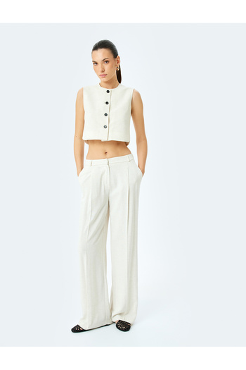 Koton Round neck linen blend buttoned sleeveless crop vest.