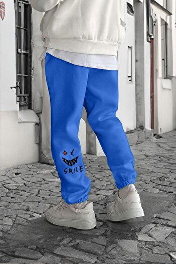 DUBU BUTİK Smile Face Sax Blue Jogger vékony melegítőnadrág – elasztikus lábnyomott, kényelmes stílus, lábnyomat részleteivel