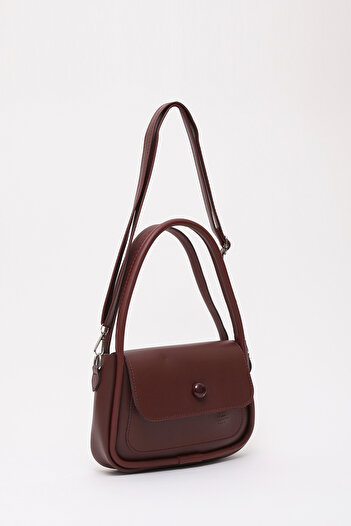 SHAKA Claret Red Shk97 Faux Leather Hand, Arm and Shoulder Bag with Front Pocket Detail and 2 Compartments with Adjustable Strap