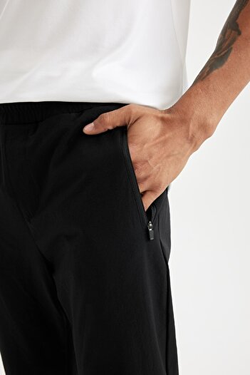 DeFacto Fit Dokuma Sporcu Jogger Eşofman Altı Slim Fit Dar Kesim Çift Cepli C1212ax24au