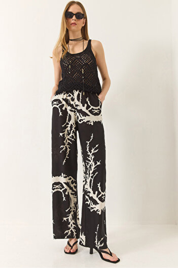 Bianco Lucci Women's Elastic Waist Patterned Pocket Detailed Flowy Viscose Palazzo Trousers 60284035