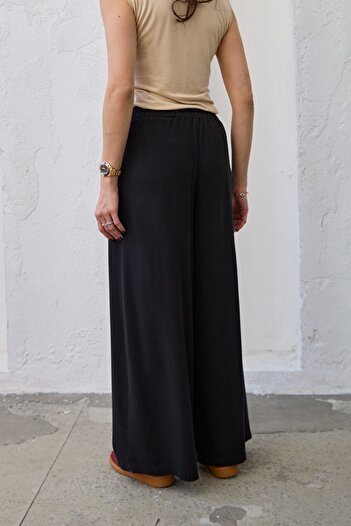QANU Elastic Skin-Sel Trousers Black