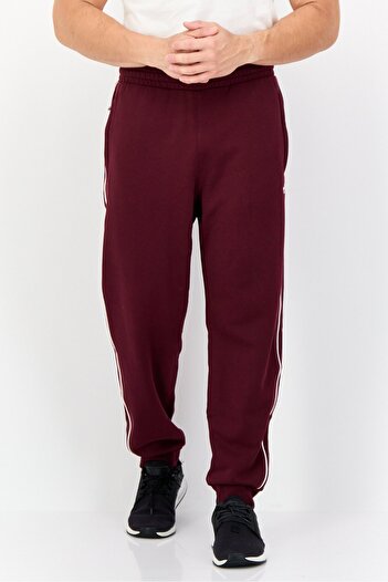adidas Men Slim Fit Outdoor Seasonal Archive Sweatpants, Maroon
