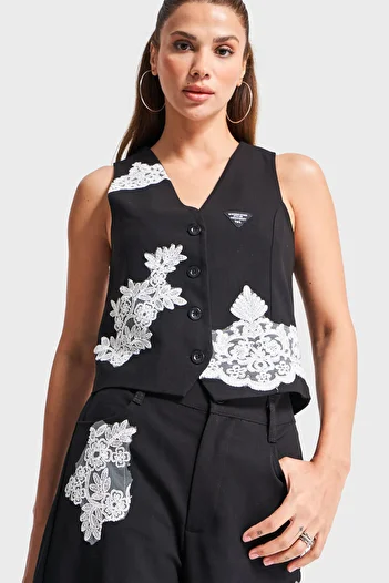 its basic Women's Black Color Lace Embroidered Zero Sleeve Button Design Fabric Vest
