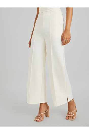 Styli Pin Tuck Detail Slit Hem Straight Knit Pants