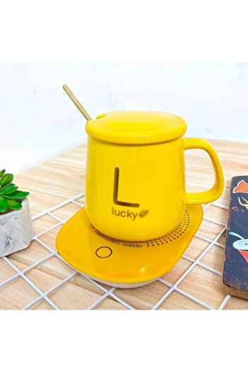 ABYZ Ceramic heated mug set, 350ml, elegant design with gold 'Lucky' writing and vibrant yellow color