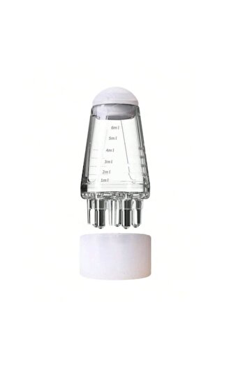 The Casius. Small device with roller balls for oil scalp massage, 2.5 x 2.5 x 5 cm