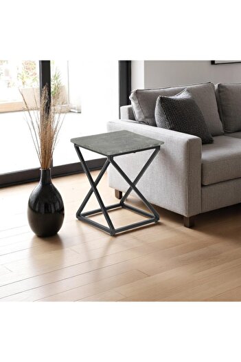 mr-everything A modern square serving table featuring a concrete-like grey top and a crossed black metal base.