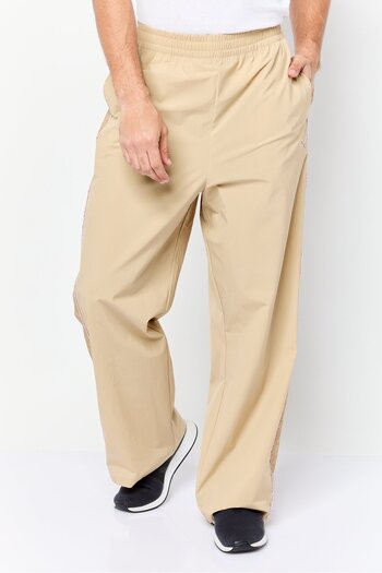 Puma x Sophia Chang Men Sportswear Fit Training Wige Leg Track Pants, Beige