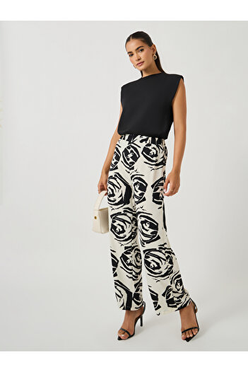 Take Two By Styli Solid Sleeveless Knit Top and Floral Print Wide Leg Pants Co-Ords