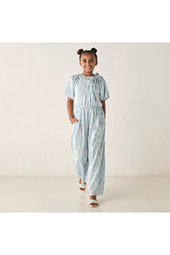Juniors Striped Jumpsuit With Bow Detail