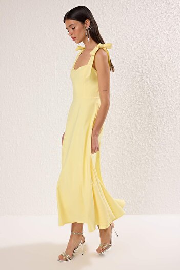 Trendyol Collection Rochie de seară midi, galben deschis, croială în A, cu bretele legate TPRSS24EL00251