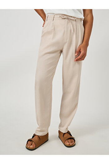Styli Textured Pleated Tapered Fit Trousers