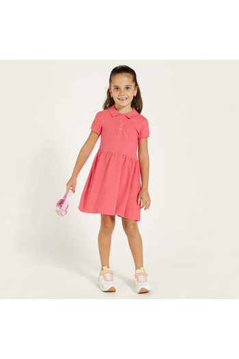 Juniors Solid Polo Dress With Short Sleeves And Button Closure
