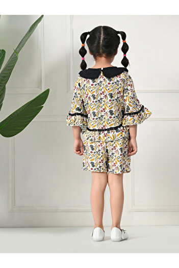 Bella Moda By Styli Printed Ruffled Hem Round Neck Top and Shorts Set