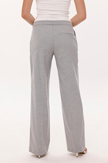 LA PANTE Belt Garnished Lace-Up Side Pants