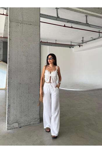 BERBUR STORE White Loose Cut Linen Trousers