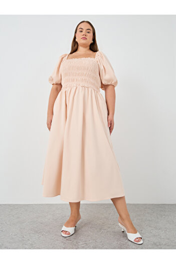 Styli Plus Size Puff Sleeve Smocked Detail A-Line Midi Dress