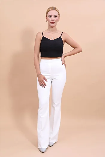 ÖNDER ÖZSOY Flared Trousers-White