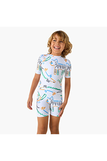 Juniors Printed Swimsuit with Short Sleeves and Zip Closure