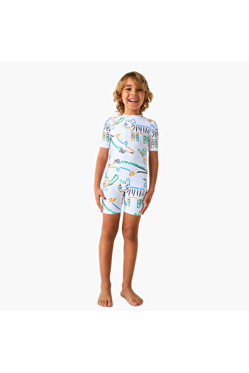 Juniors Printed Swimsuit with Short Sleeves and Zip Closure