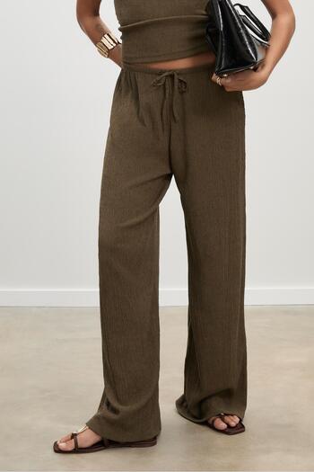 Stradivarius Flowing creased-effect trousers