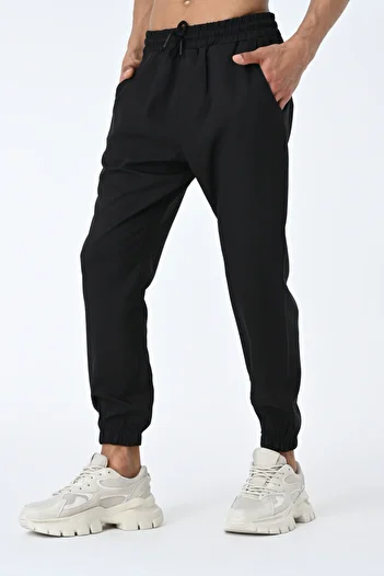 AMAZING CRASH Rubber Leg Raised Jogger Pants