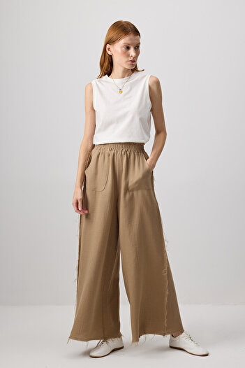 Touché Privé Wide Leg Muslin Trousers with Pockets