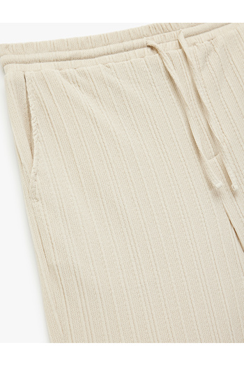 Koton Textured Bermuda Shorts with Lace-Up Waist and Pocket Detail