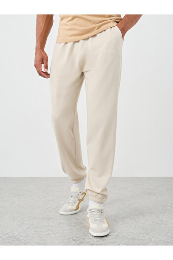 Styli Typography Embossed Oversized Elasticated Cuffed Joggers