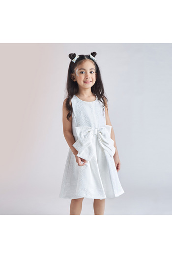 Juniors Floral Textured Sleeveless Romper with Bow Applique and Round Neck