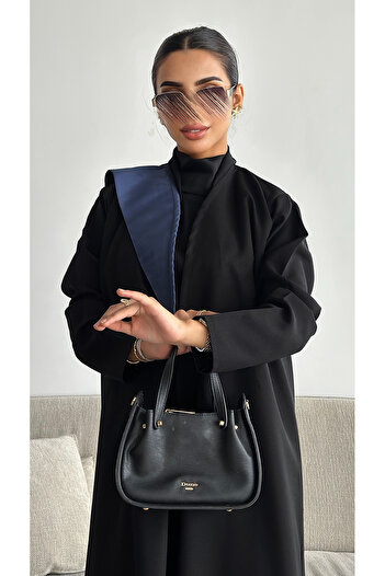 outline Luxurious black abaya with elegant navy blue details