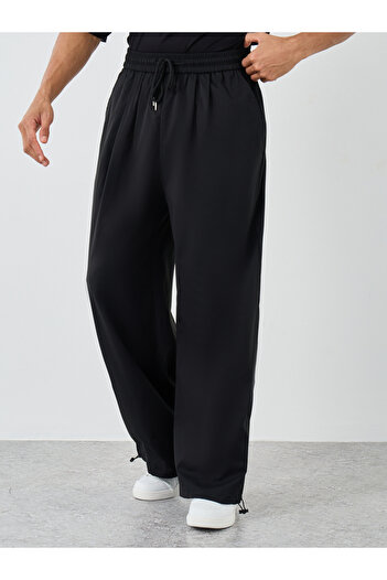 Styli Men Black Casual Baggy Parachute Pants