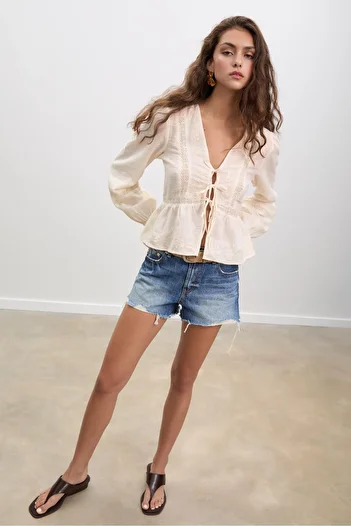 Stradivarius Loose-fitting embroidered knot blouse