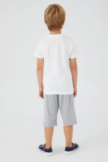 U.S. Polo Assn. بدلة كابري للأولاد بنمط كريمي من Palm Us1360