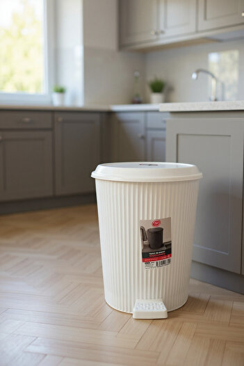 Living Set of trash bins, 3 pieces of different sizes, with a foot pedal and lid, white color.