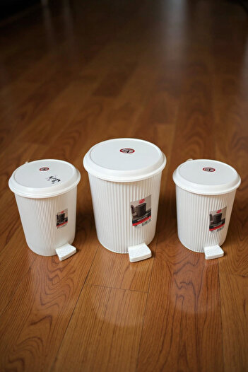Living Set of trash bins, 3 pieces of different sizes, with a foot pedal and lid, white color.