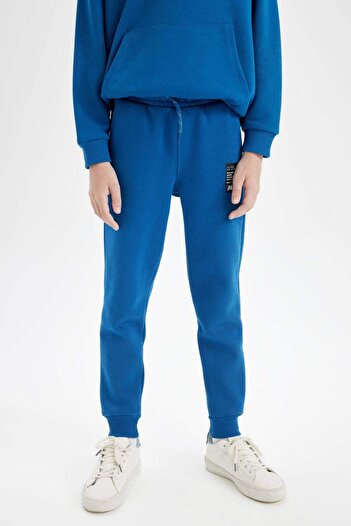 DeFacto Erkek Çocuk Dokuma Etiketli Beli Paçası Lastikli Cepli Basic Düz Okul Jogger Eşofman Altı D1648A824A