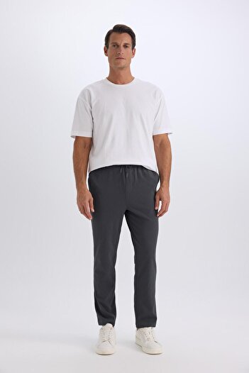 DeFacto Relax Fit Rahat Kesim Düz Paça Krinkıl Yazlık Kumaş Pantolon C3930AX24SM
