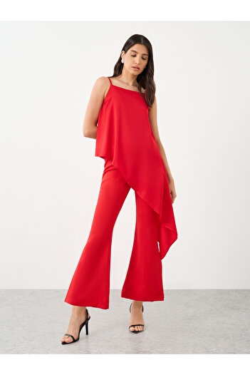 Styli Solid Asymmetrical Hem Cami Top with Flare Pants Co-Ords