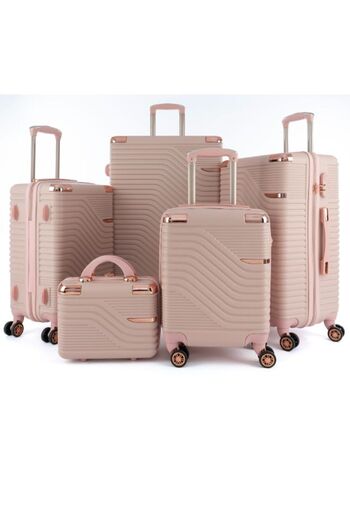 LİMRA 5-piece luggage set with 4 wheels, solid and modern design.