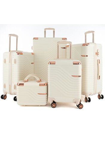 LİMRA 5-piece luggage set with 4 wheels, solid and modern design.