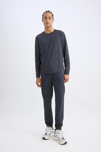 DeFacto Standard Fit Jogger Sweatpants - Waist Lace-Up with Elastic Leg Pockets D1901Ax24Au