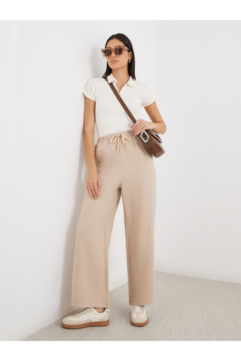 Styli Women Cream Solid Drawstring Waist Wide Leg Pants