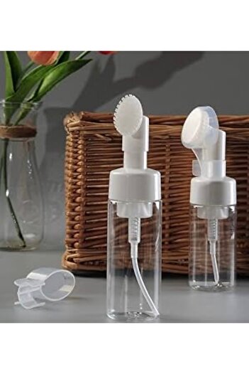 Generic 2 empty containers with a silicone brush for cleansing the skin